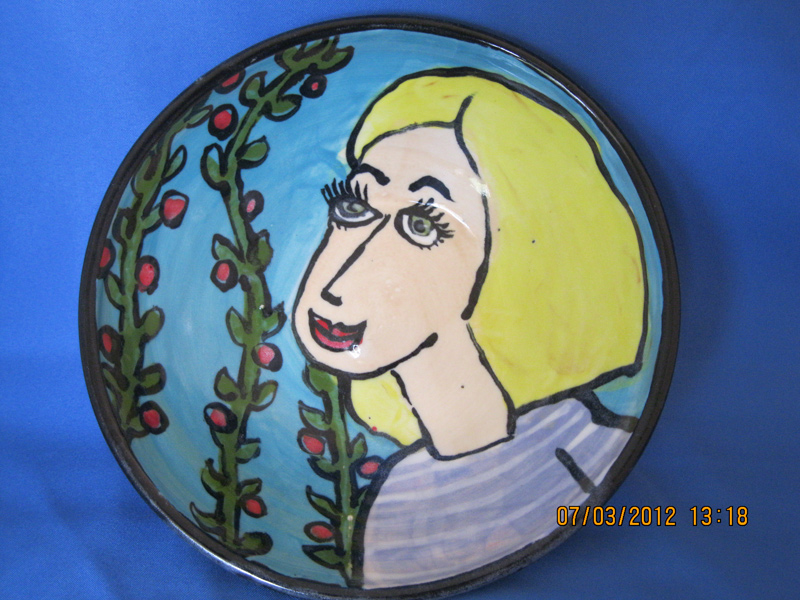 Blue Bowl with flowers and a blond Blue Bowl with flowers and a blond